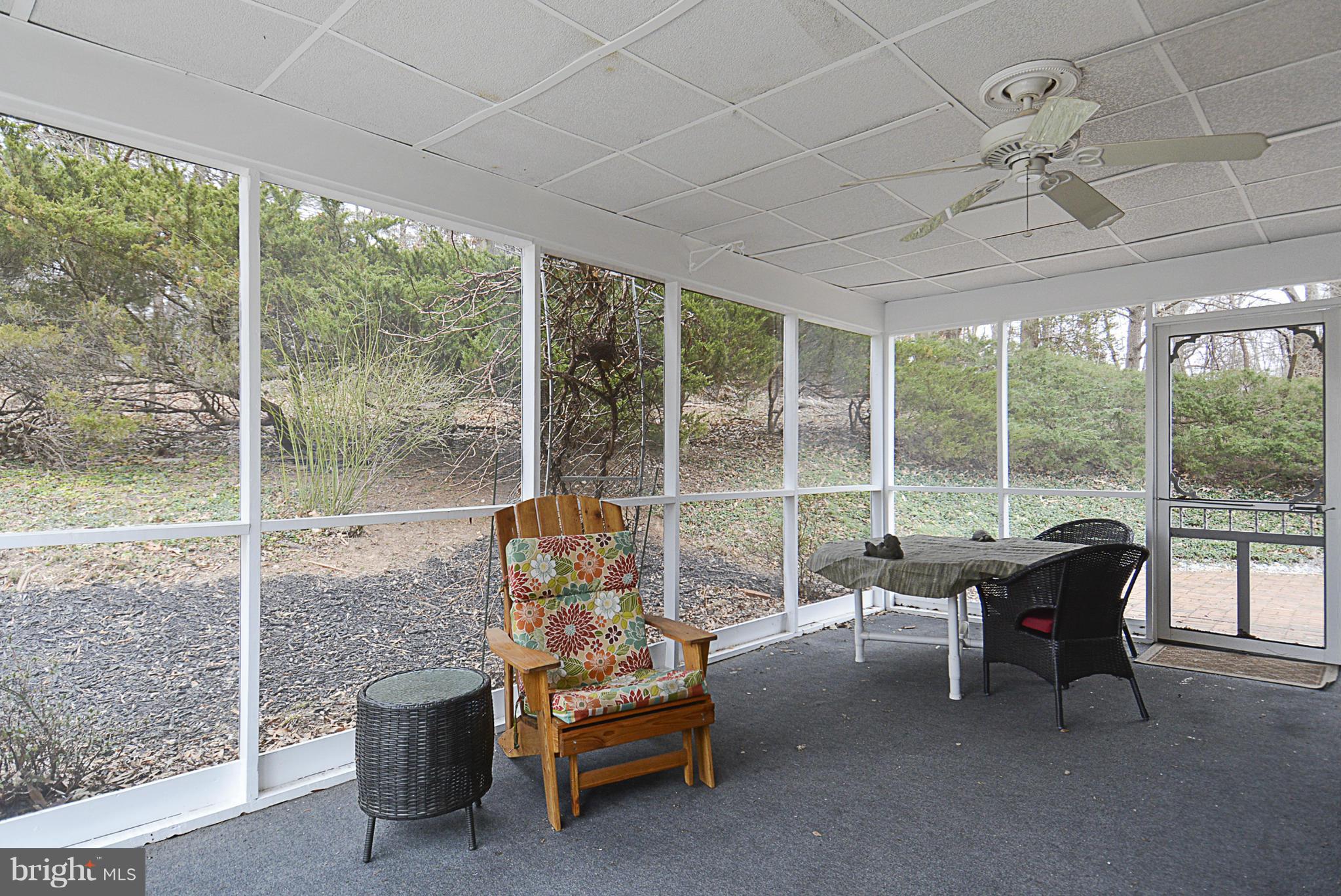 15709 Riding Stable Road Laurel, MD 20707 - Photo 6 of 30 Screened porch expands living area