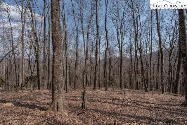 a view of wooden fence of a house