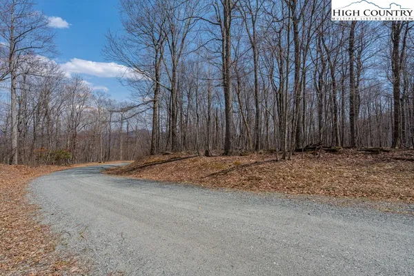 a view of a backyard of the house