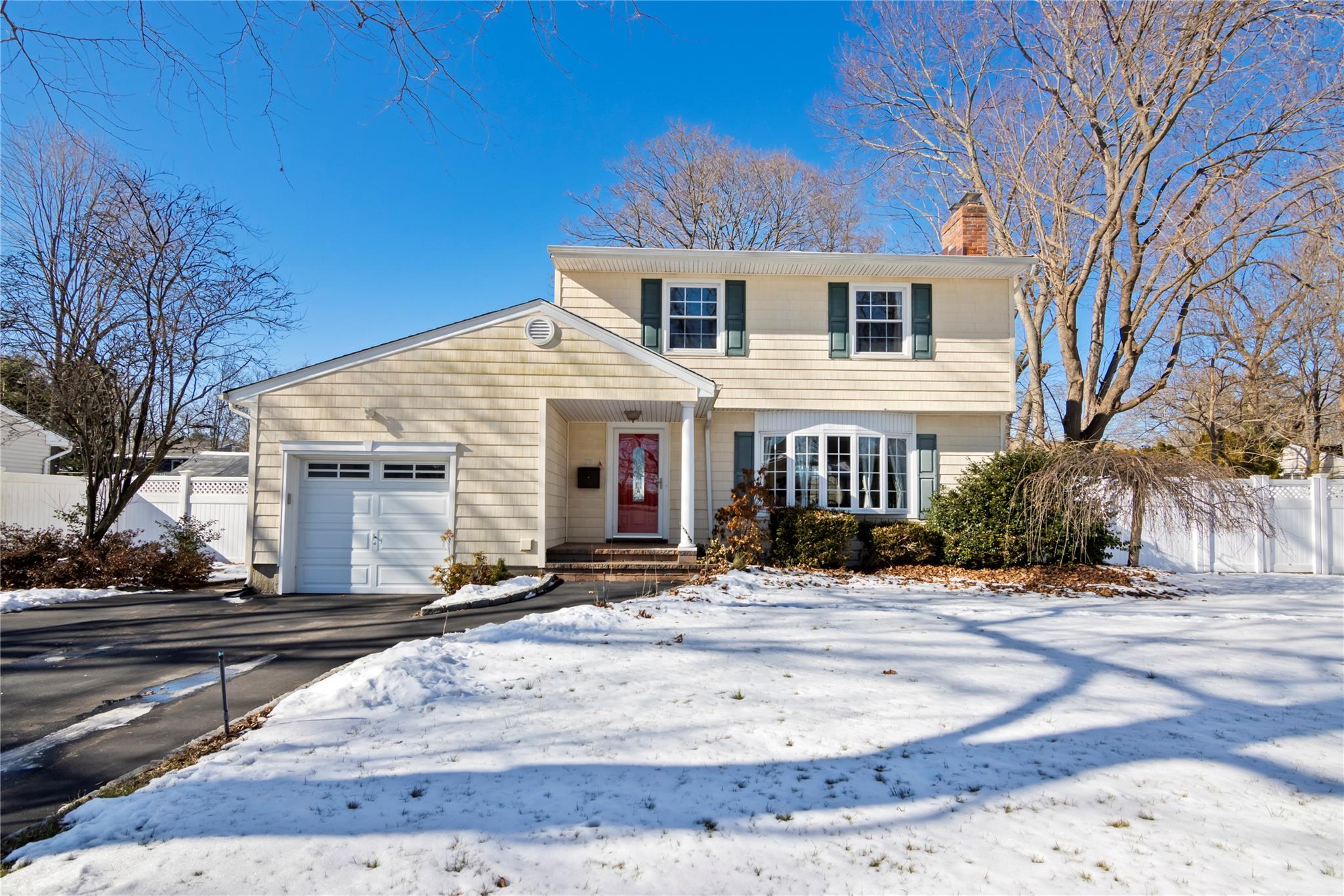 39 Earl Road Melville, NY 11747 - Photo 1 of 1 View of front of property featuring a garage