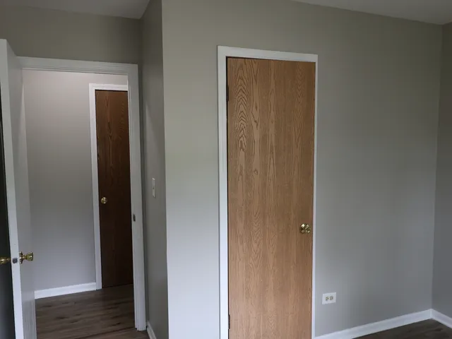 a view of a bathroom from the hallway