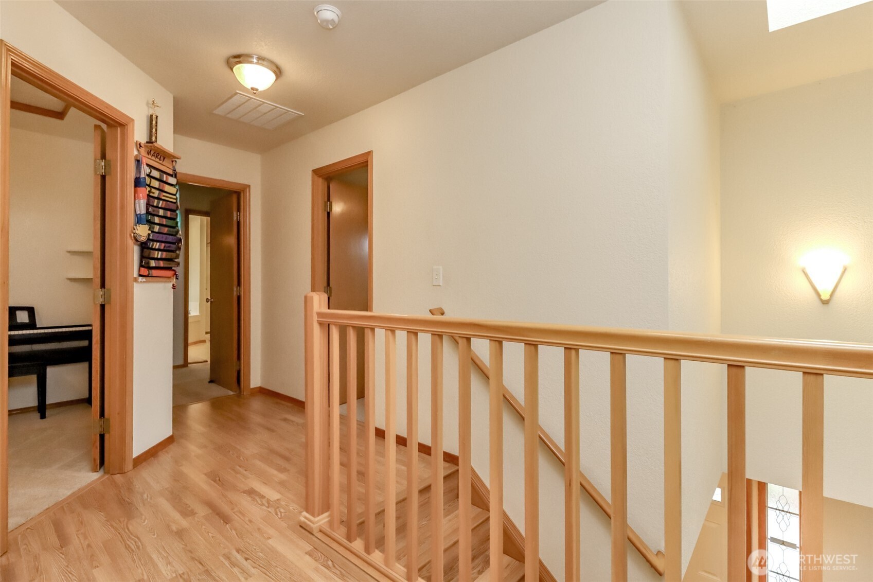 5475 Park Pl Loop Southeast Lacey, WA 98503 - Photo 18 of 40 a view of hallway with wooden floor