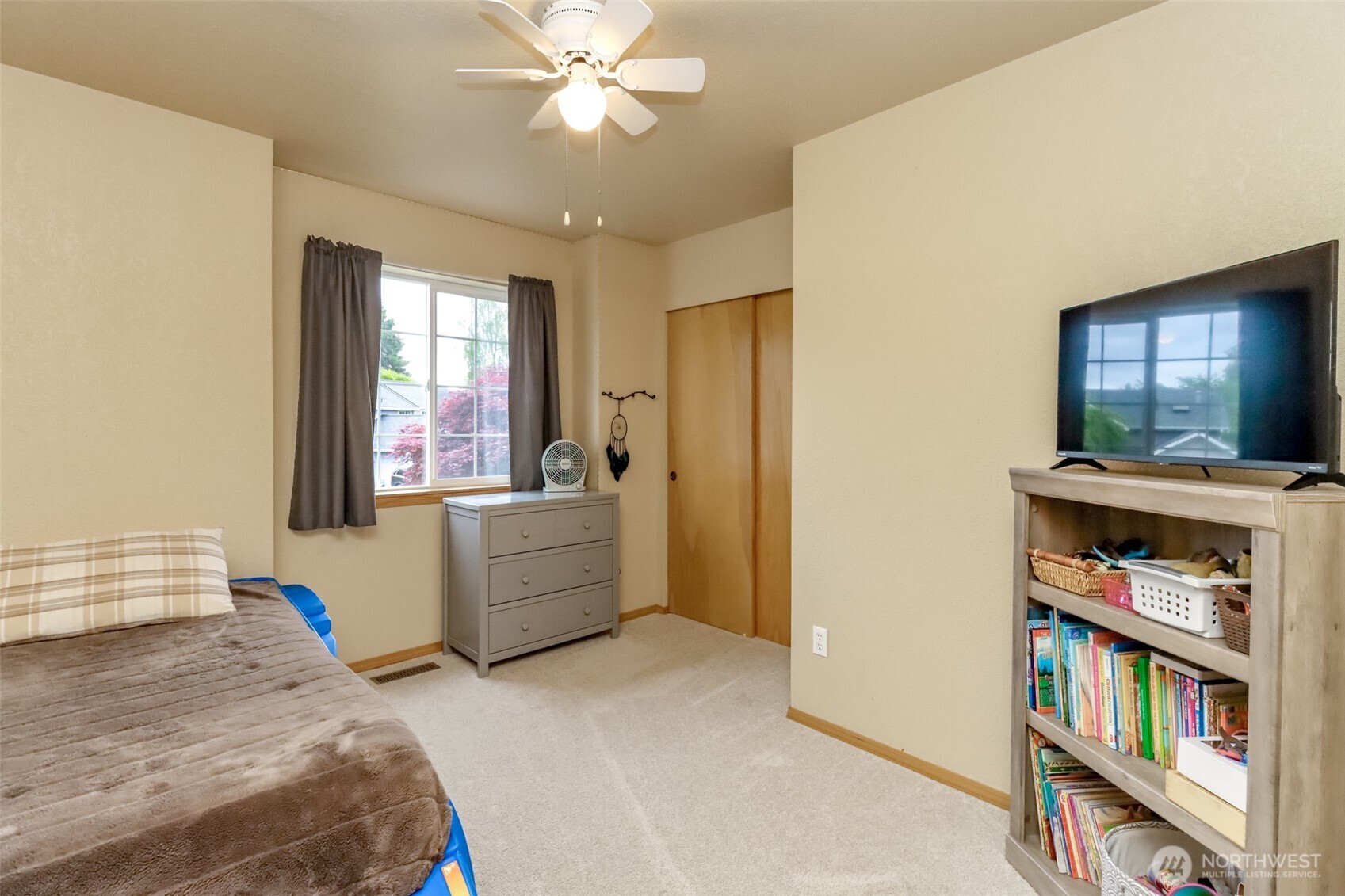 5475 Park Pl Loop Southeast Lacey, WA 98503 - Photo 22 of 40 a bedroom with furniture and a window