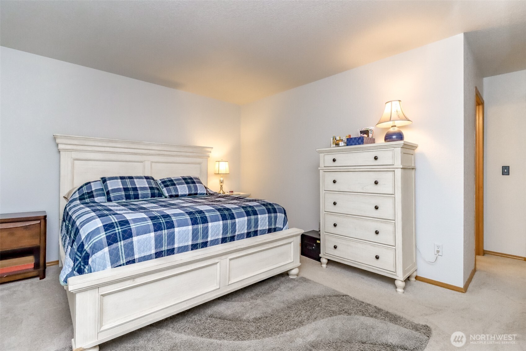 5475 Park Pl Loop Southeast Lacey, WA 98503 - Photo 23 of 40 a bedroom with a bed and a dresser