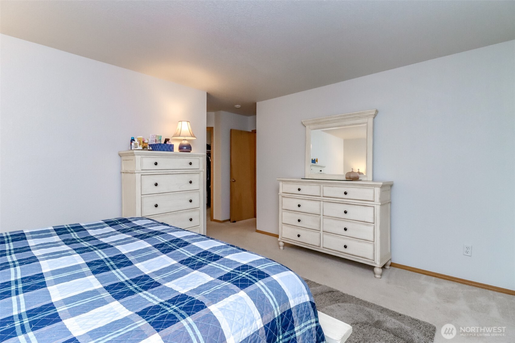 5475 Park Pl Loop Southeast Lacey, WA 98503 - Photo 24 of 40 a bedroom with a dresser and a mirror