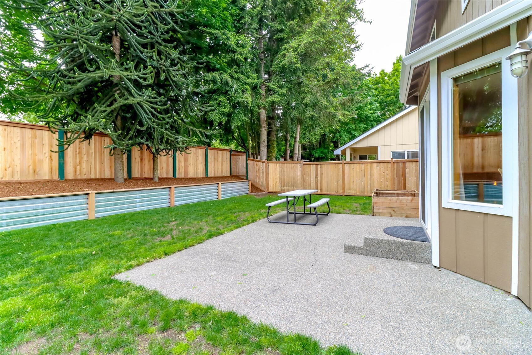 5475 Park Pl Loop Southeast Lacey, WA 98503 - Photo 30 of 40 a view of a porch with a garden
