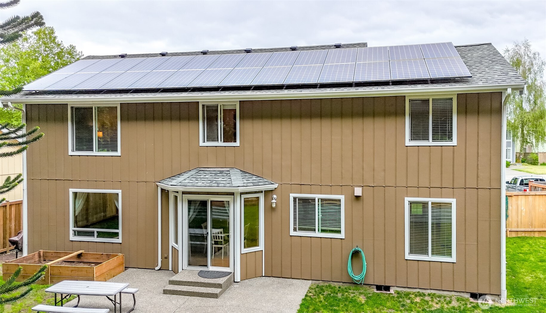 5475 Park Pl Loop Southeast Lacey, WA 98503 - Photo 32 of 40 a front view of a house with a garden