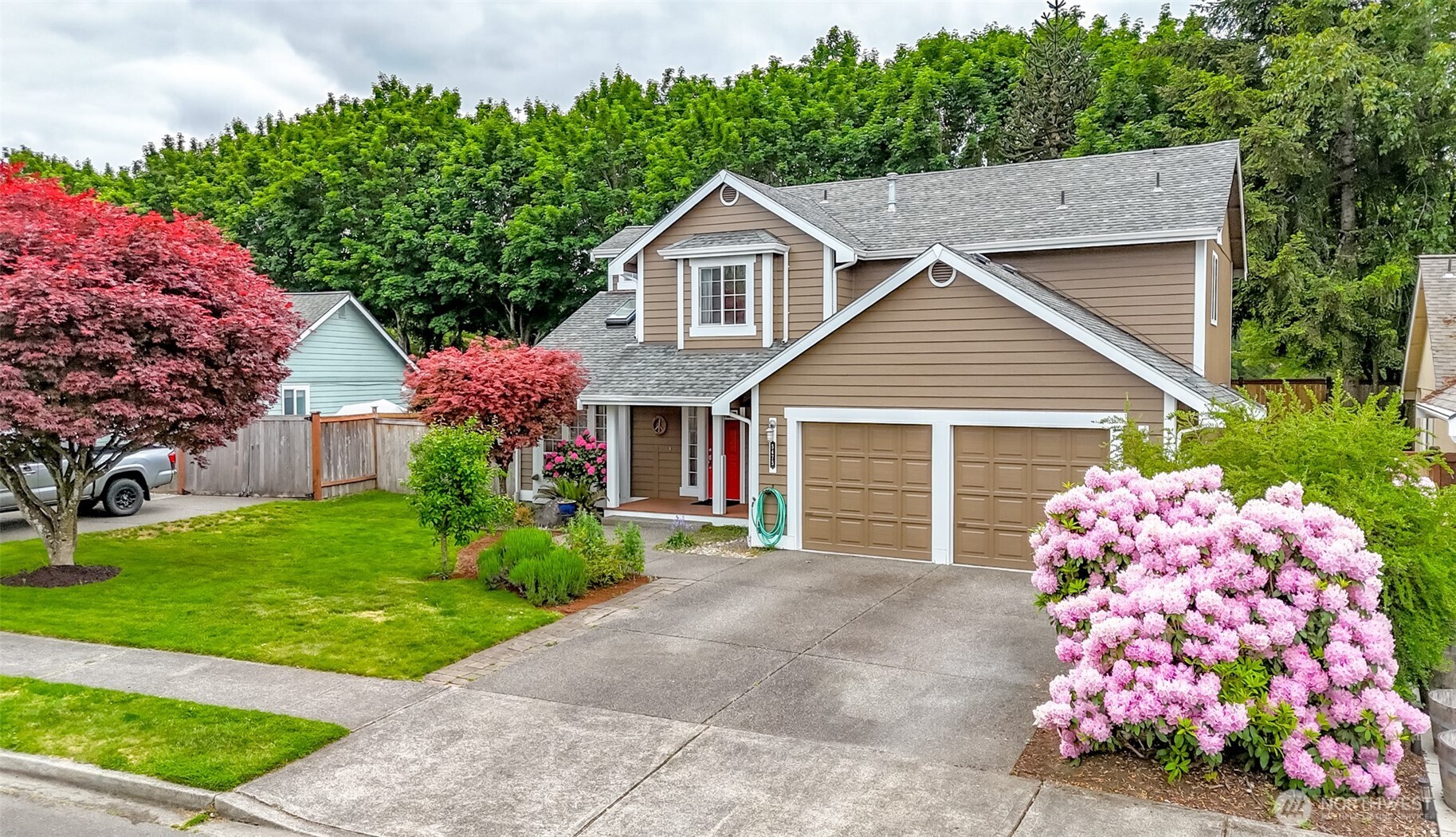5475 Park Pl Loop Southeast Lacey, WA 98503 - Photo 40 of 40 a front view of a house with garden