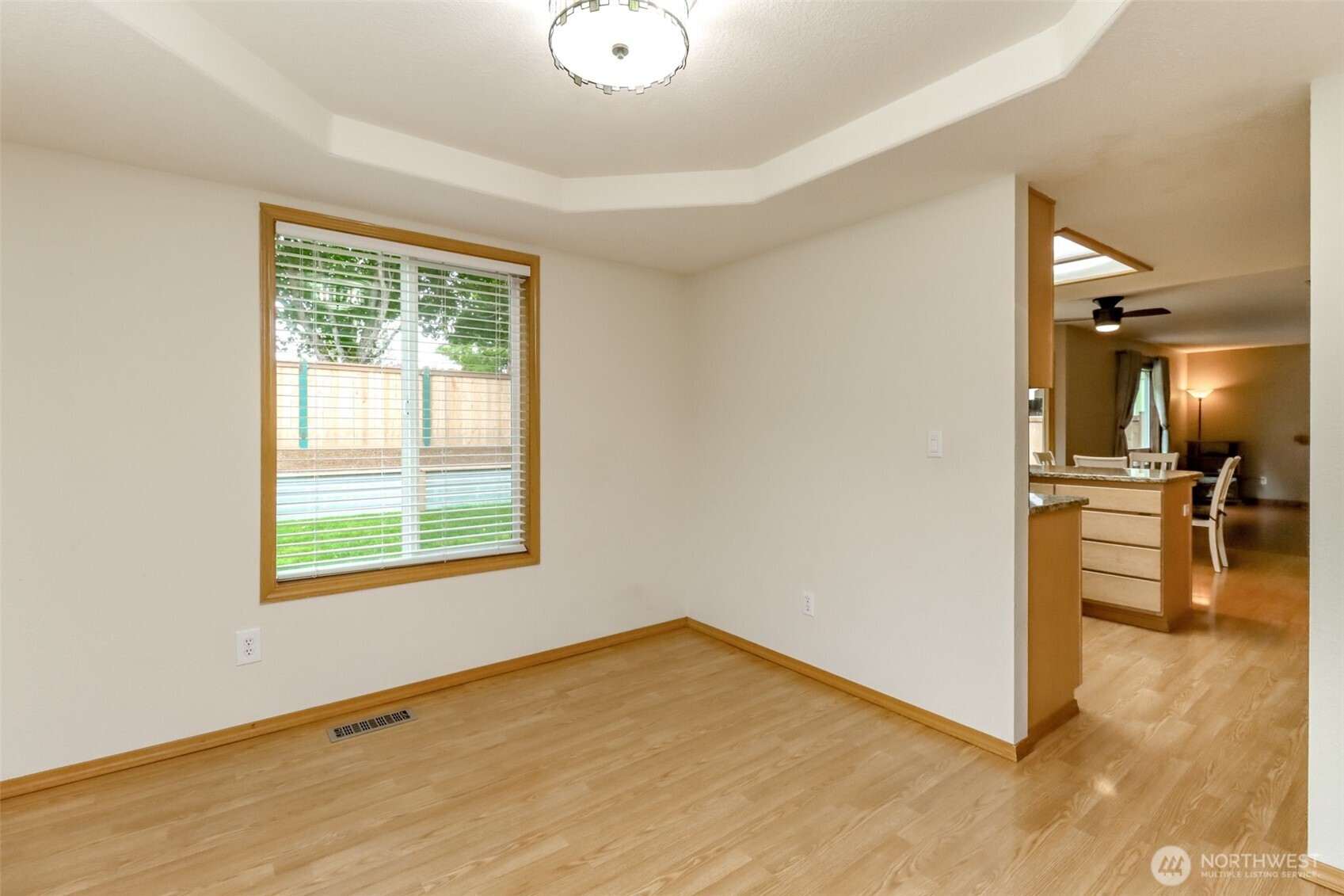 5475 Park Pl Loop Southeast Lacey, WA 98503 - Photo 9 of 40 wooden floor in an empty room with a window