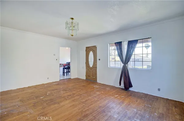 a bedroom with a bed and a walk in closet