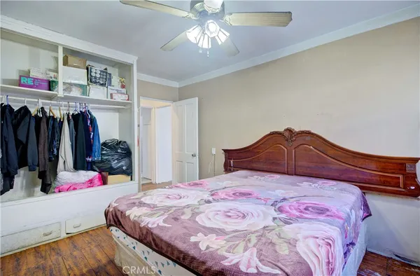 a living room with a couch and a stove top oven