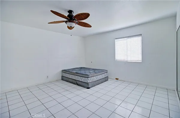 a view of empty room with windows