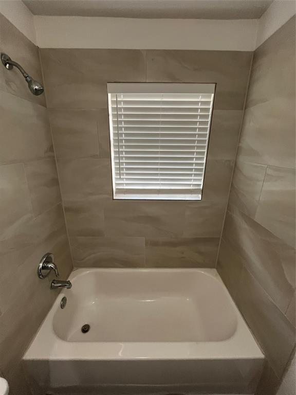1107 Calle Real Mesquite, TX 75149 - Photo 16 of 24 a bathroom with a tub