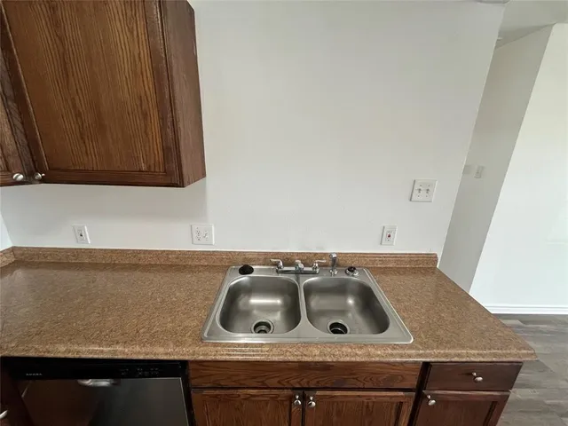 a kitchen with a stove and a cabinet