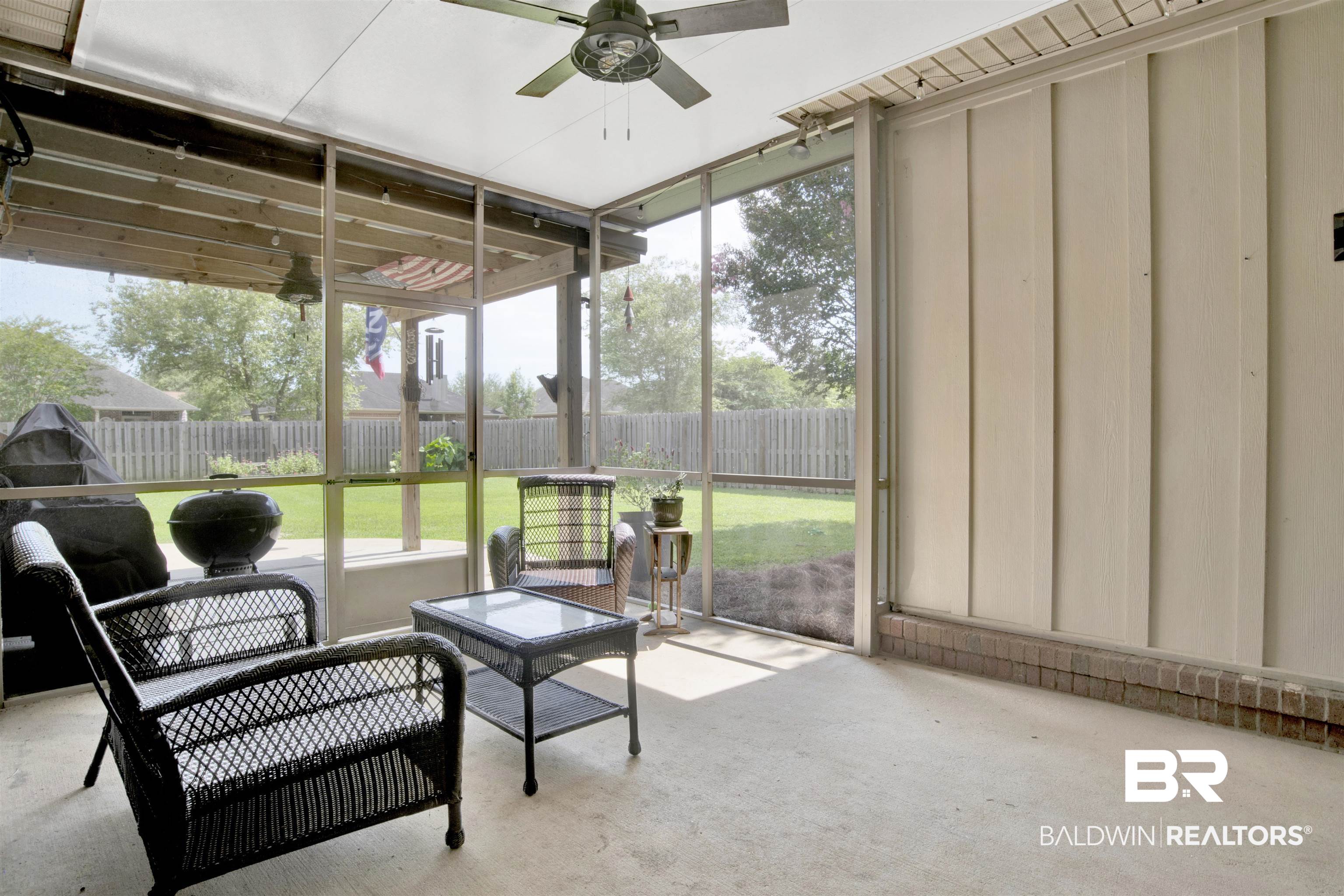 10368 Gayfer Rd Extension Fairhope, AL 36532 - Photo 32 of 43 Screened patio with a concrete floor, ceiling fan, and slatted wood ceiling