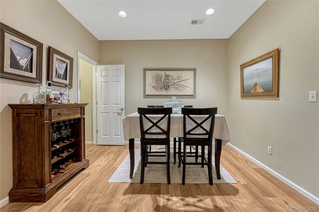 a view of a livingroom with furniture and workspace