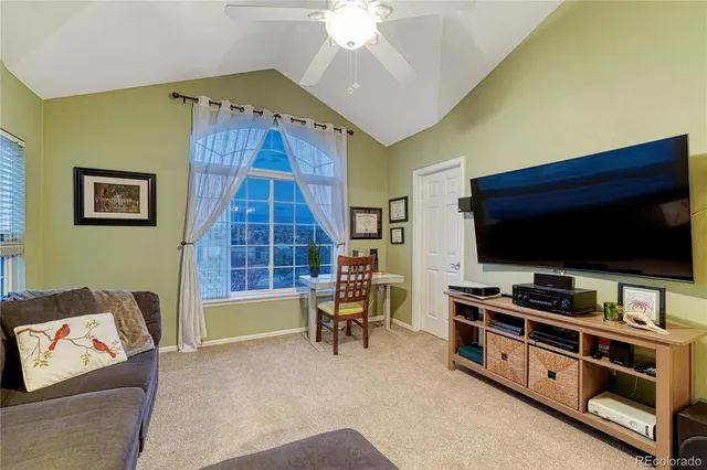 a living room with furniture and a couch