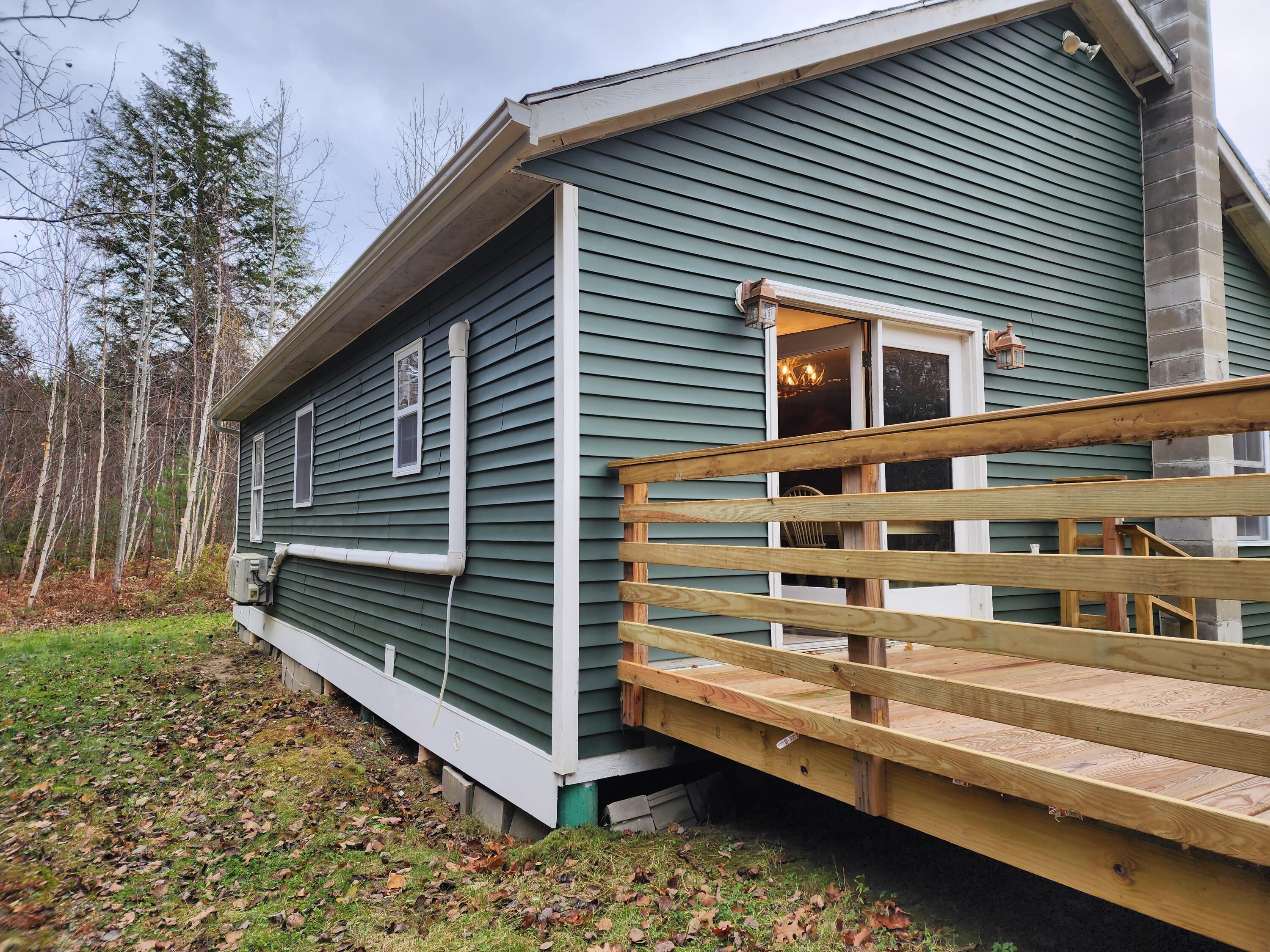 231 Swan Road New Sharon, ME 04955 - Photo 7 of 32 Private back deck