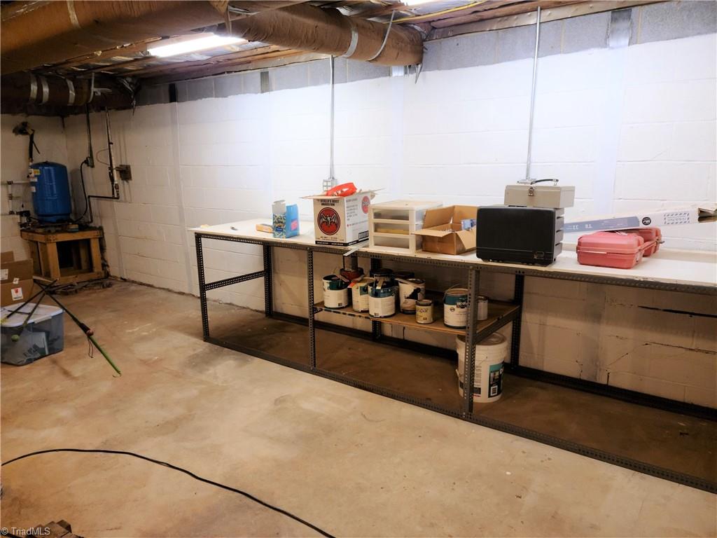 8074 Idols Road Clemmons, NC 27012 - Photo 16 of 21 Work table to stay
