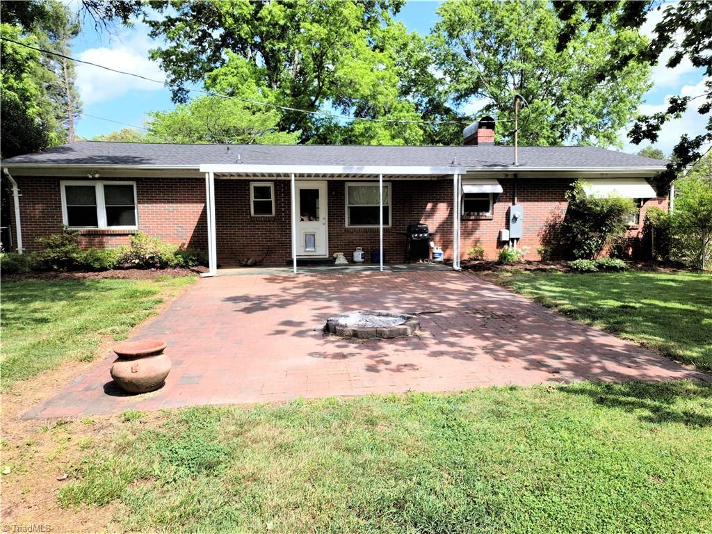 8074 Idols Road Clemmons, NC 27012 - Photo 21 of 21 Back patio and firepit