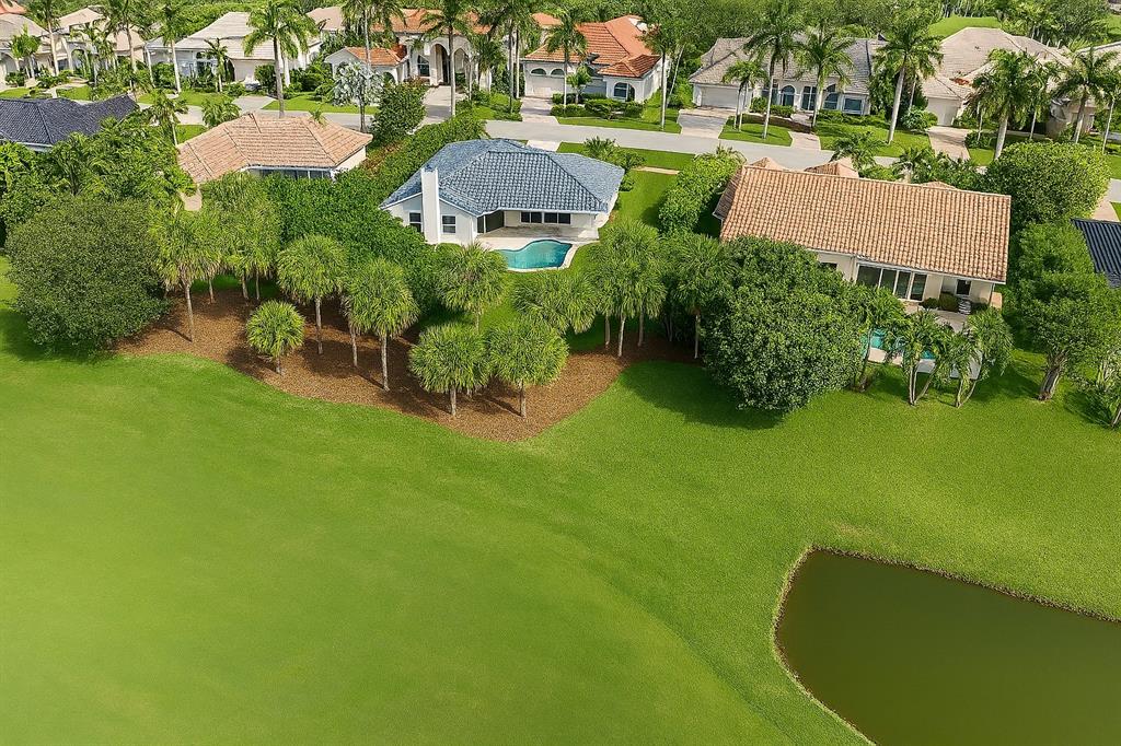 17651 Foxborough Lane Boca Raton, FL 33496 - Photo 3 of 3 an aerial view of a house with swimming pool garden and mountain view in back