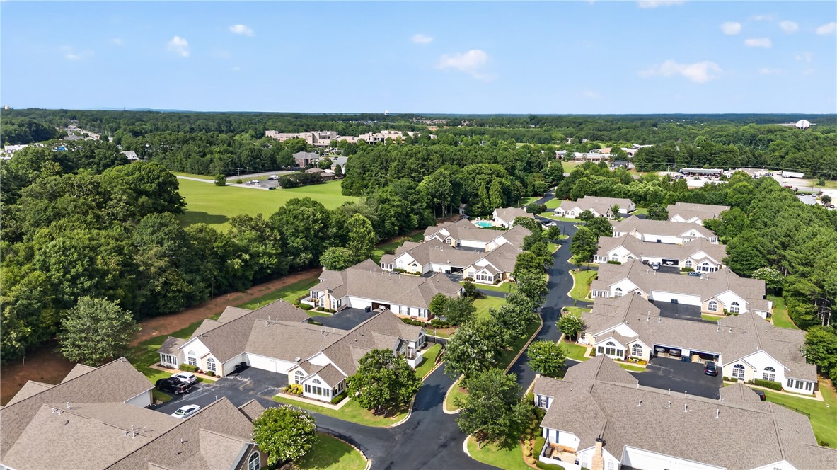 134 Life Style Lane Anderson, SC 29621 - Photo 36 of 44 An aerial perspective reveals a serene community of homes nestled amidst verdant landscaping and mature trees.