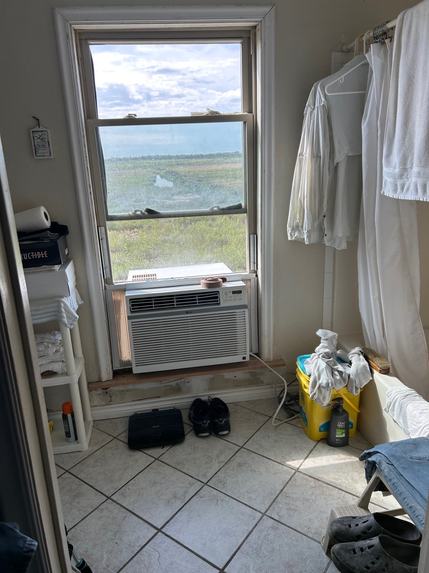 11135 Sportsman Road Galveston, TX 77554 - Photo 14 of 18 a room with window and a table