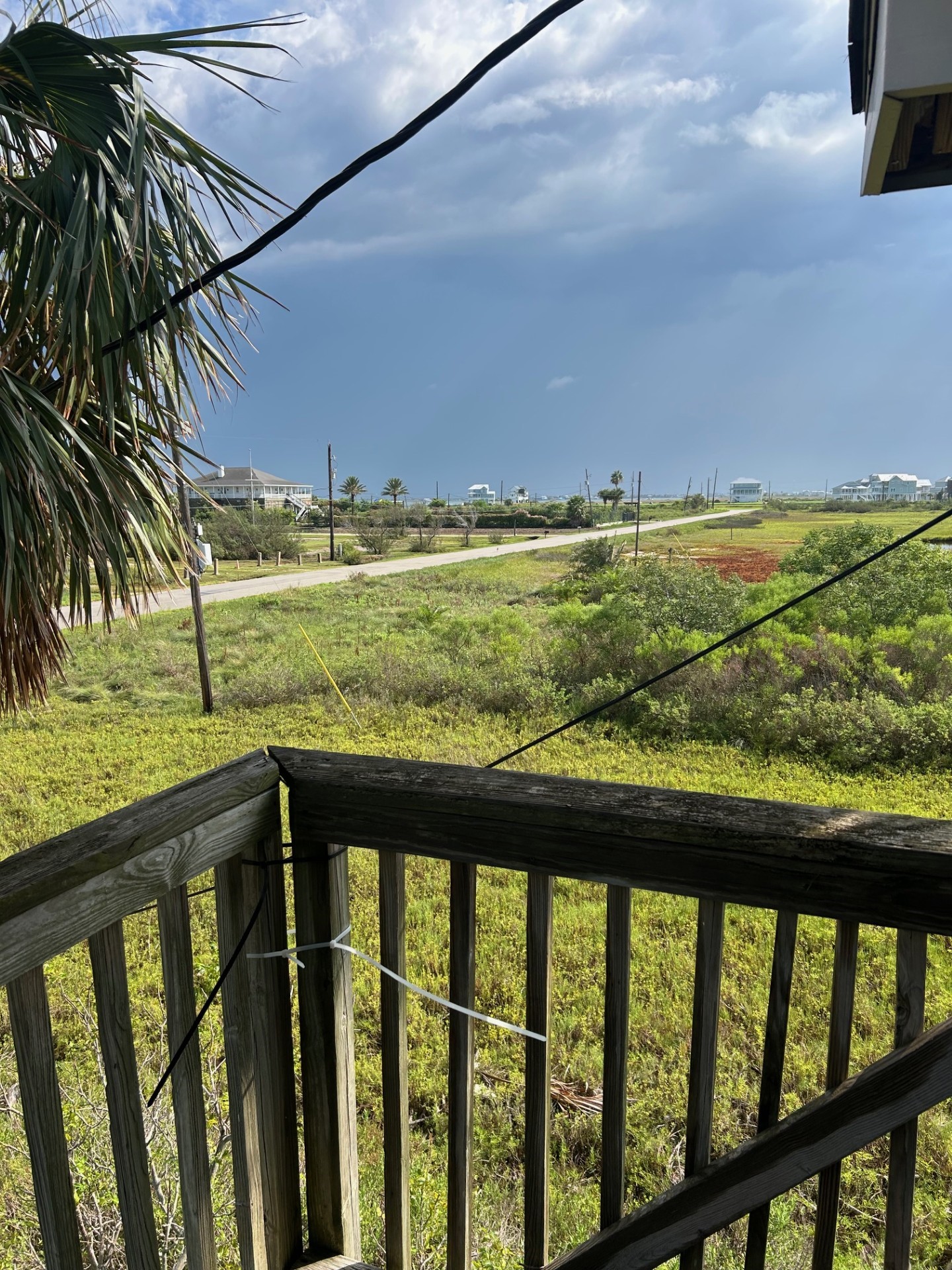 11135 Sportsman Road Galveston, TX 77554 - Photo 9 of 18 a view of ocean from a balcony