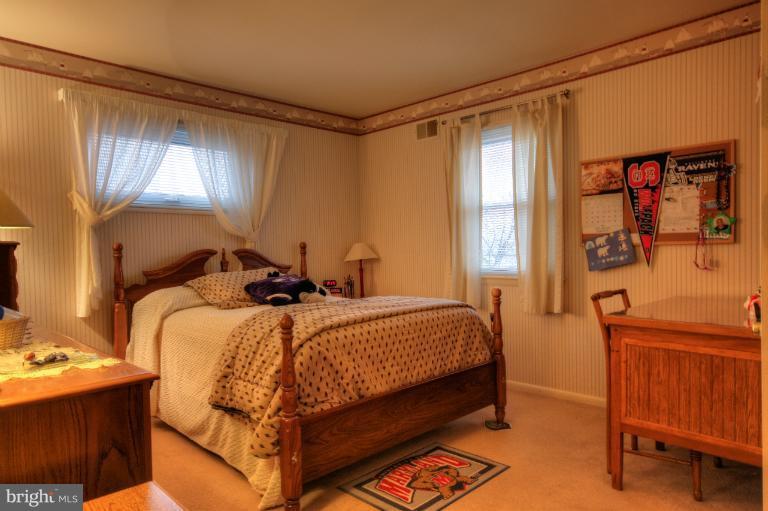 2711 Hunting Ridge Court Baldwin, MD 21013 - Photo 14 of 26 a bed room with a bed and a window