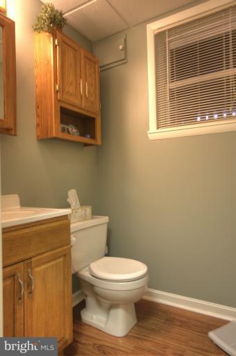 2711 Hunting Ridge Court Baldwin, MD 21013 - Photo 18 of 26 a bathroom with a toilet a sink and a window