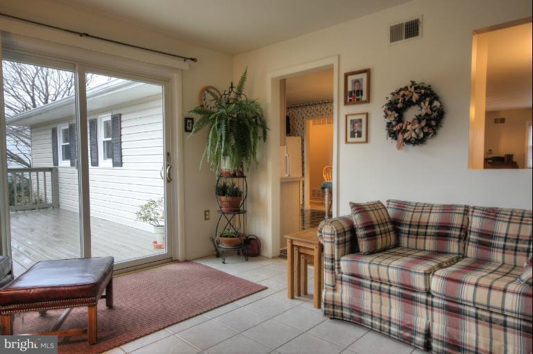 2711 Hunting Ridge Court Baldwin, MD 21013 - Photo 7 of 26 a bedroom with furniture and a potted plant