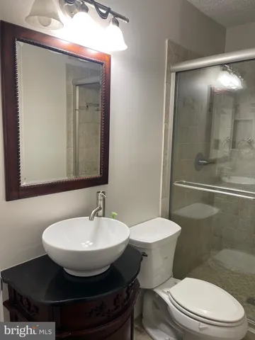 a bathroom with a sink and a toilet