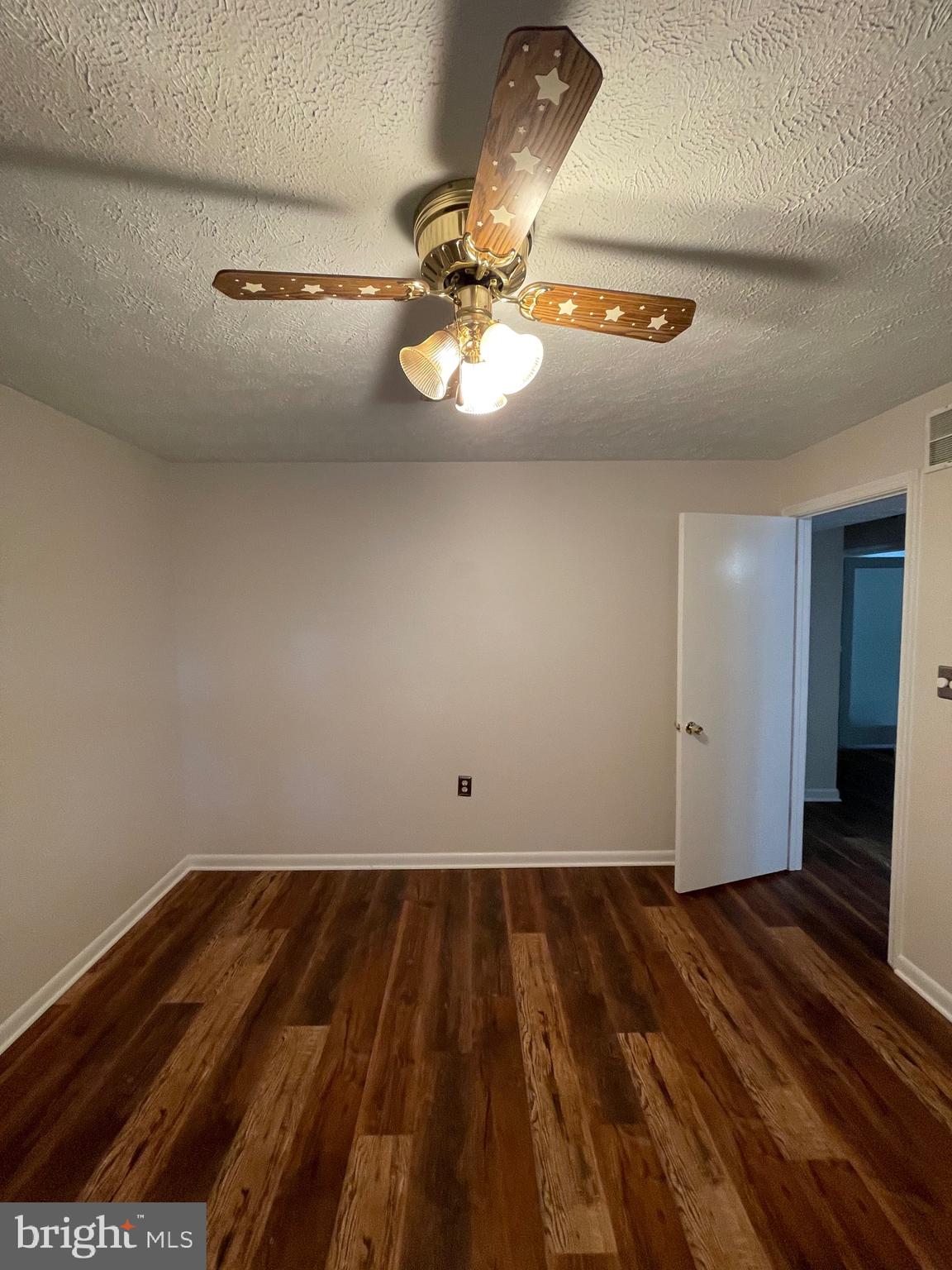 2313 Westport Lane Crofton, MD 21114 - Photo 30 of 34 a view of a room with wooden floor