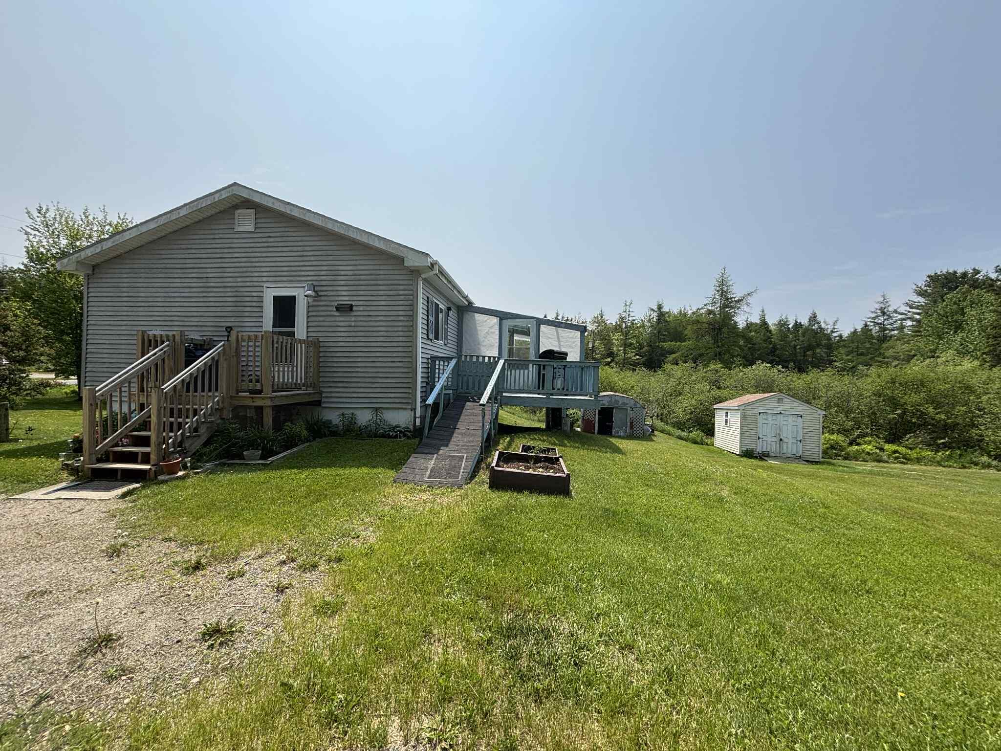 173 Kennebec Road Machias, ME 04654 - Photo 26 of 33 side of house