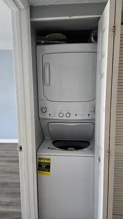 a utility room with washer and dryer