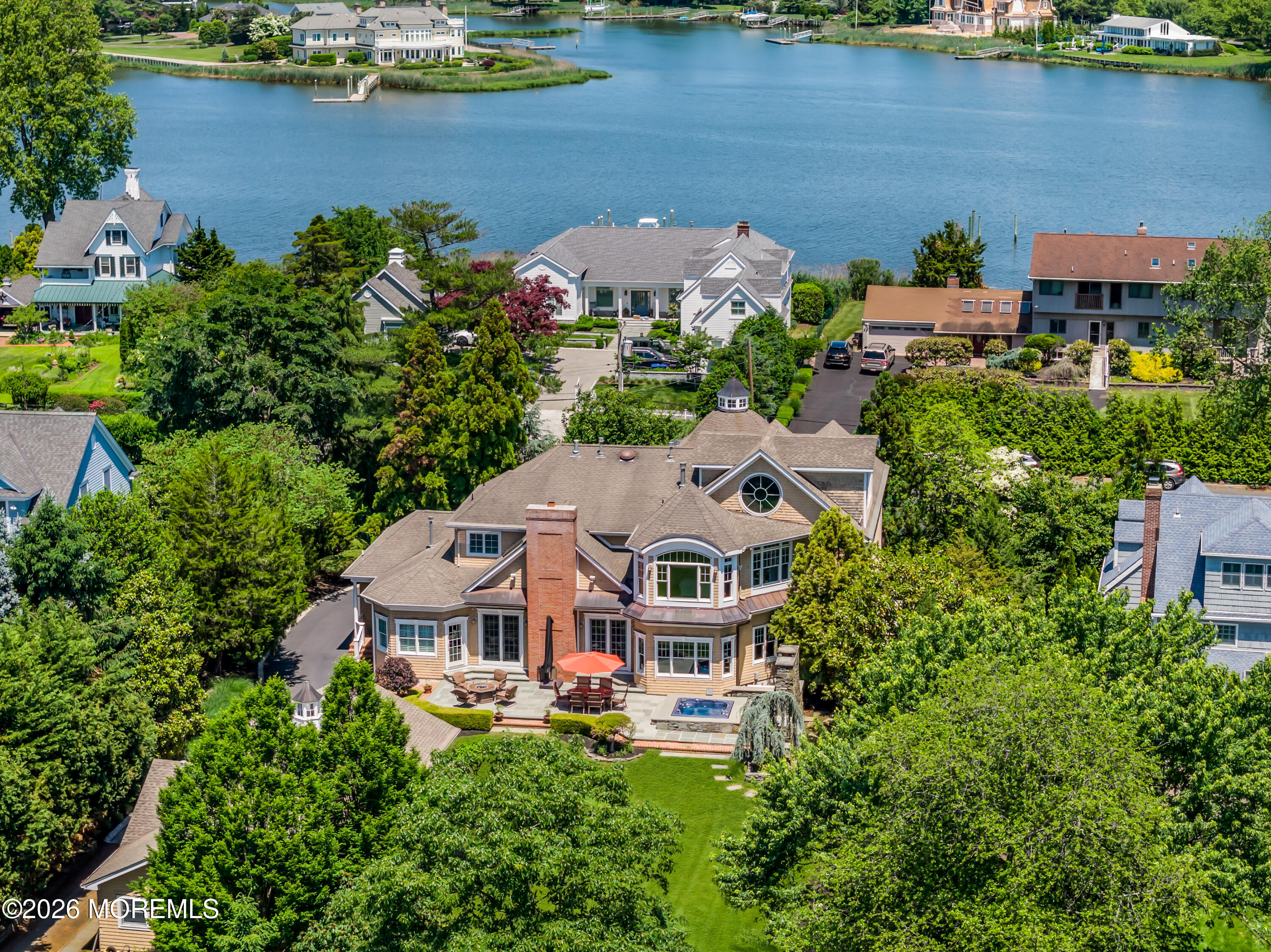 600 Little Silver Point Road Little Silver, NJ 07739 - Photo 2 of 55 an aerial view of a house with a lake view