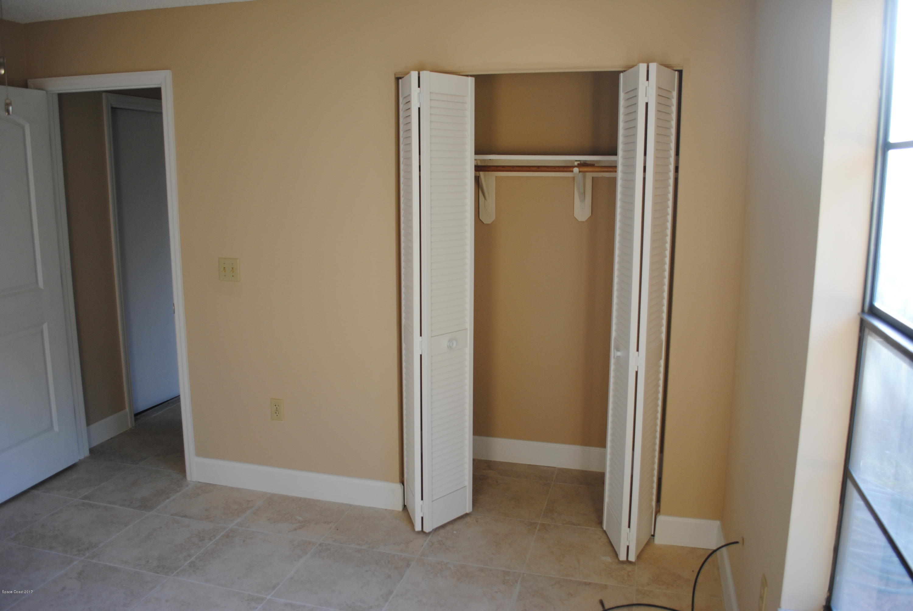 1312 Whitehurst Road Southwest Palm Bay, FL 32908 - Photo 22 of 35 a view of an empty room