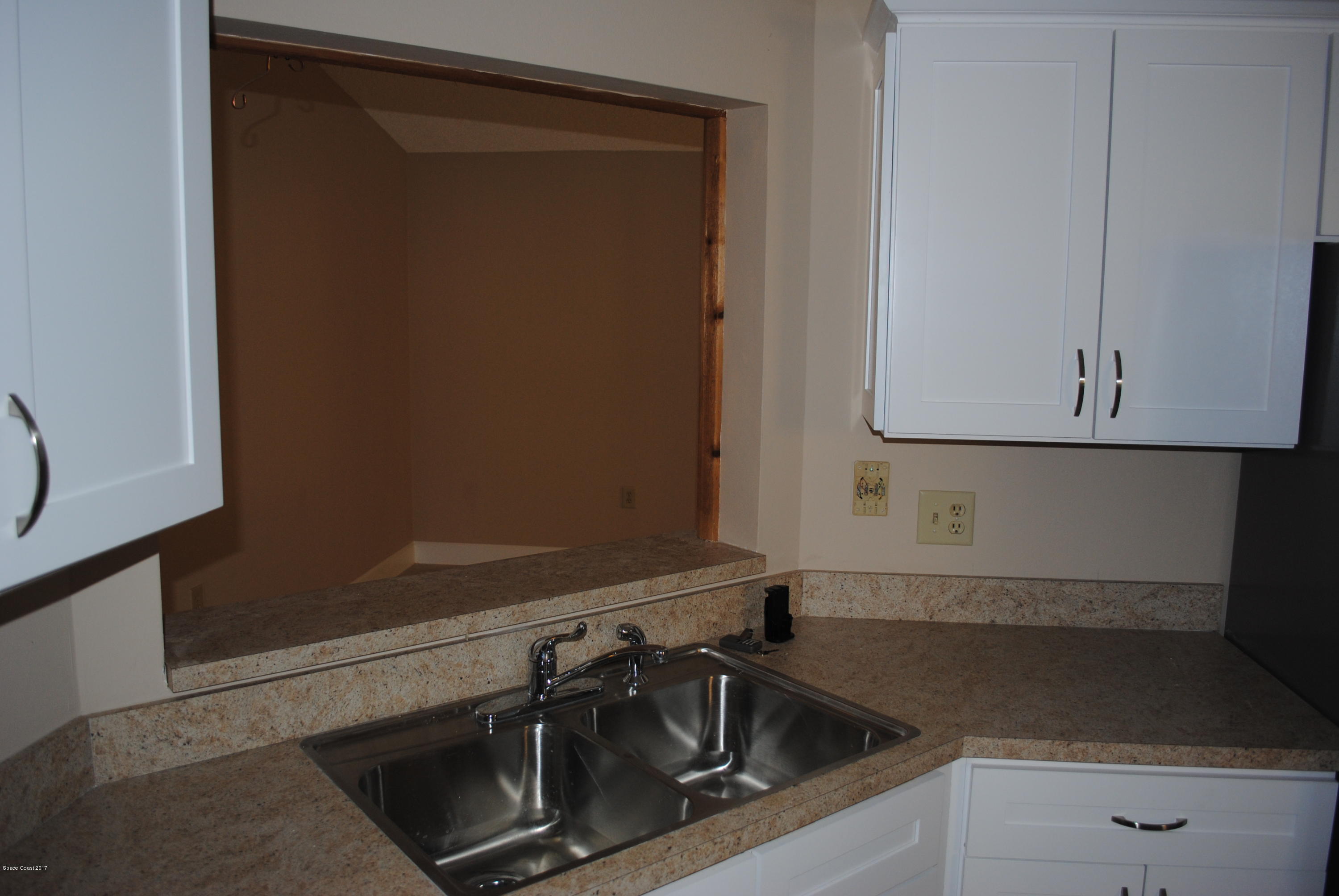 1312 Whitehurst Road Southwest Palm Bay, FL 32908 - Photo 10 of 35 a close view of a sink and tap