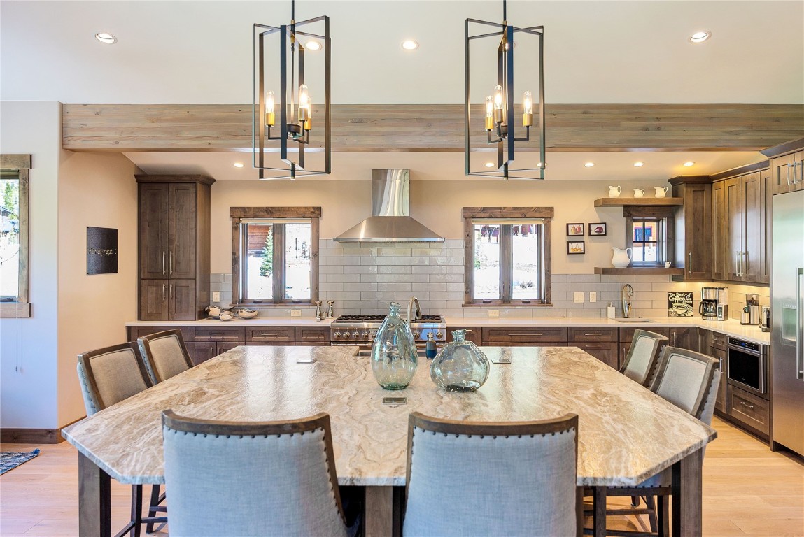 11 West Independence Road Keystone, CO 80435 - Photo 20 of 50 a dining table with chairs and wooden floor