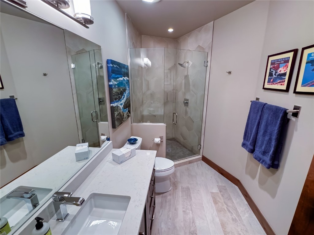 11 West Independence Road Keystone, CO 80435 - Photo 30 of 50 a bathroom with a sink a toilet and shower