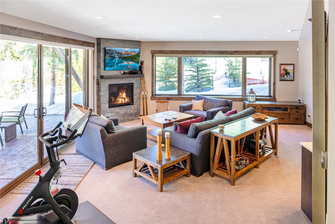 11 West Independence Road Keystone, CO 80435 - Photo 40 of 50 a living room with furniture and a fireplace