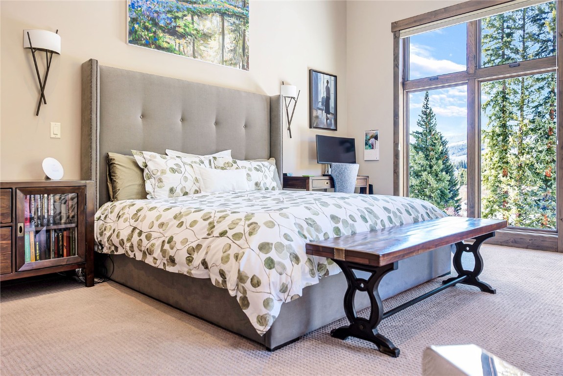 11 West Independence Road Keystone, CO 80435 - Photo 9 of 50 a bed sitting in a bedroom next to a window