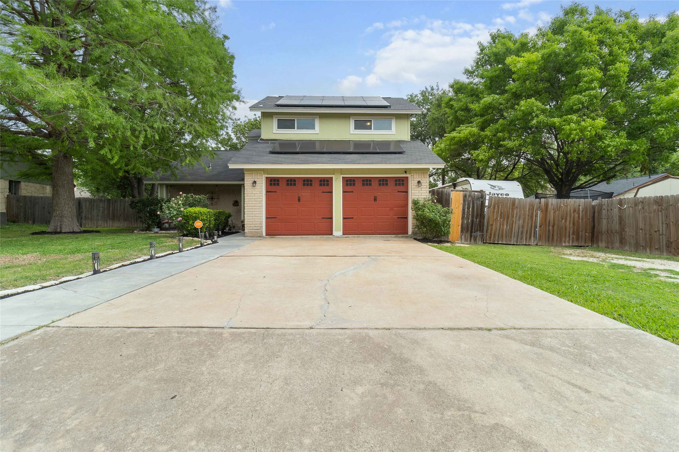 1610 Old Tract Road Pflugerville, TX 78660 - Photo 1 of 1 a front view of house with yard outdoor seating and green space