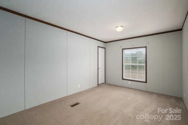 a view of small space with racks on the wall