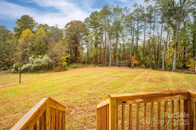 a view of an ocean yard and trees