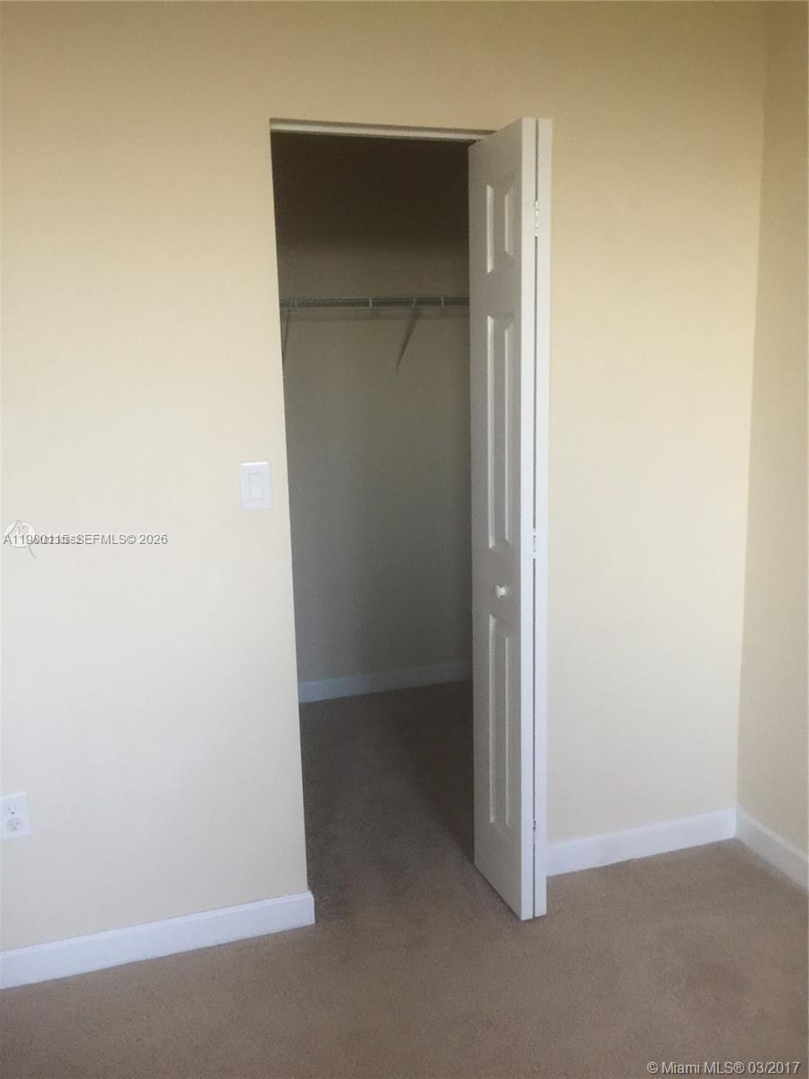 17059 Southwest 96th Street Miami, FL 33196 - Photo 18 of 22 a view of an empty room