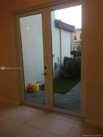 a view of a room with an empty space