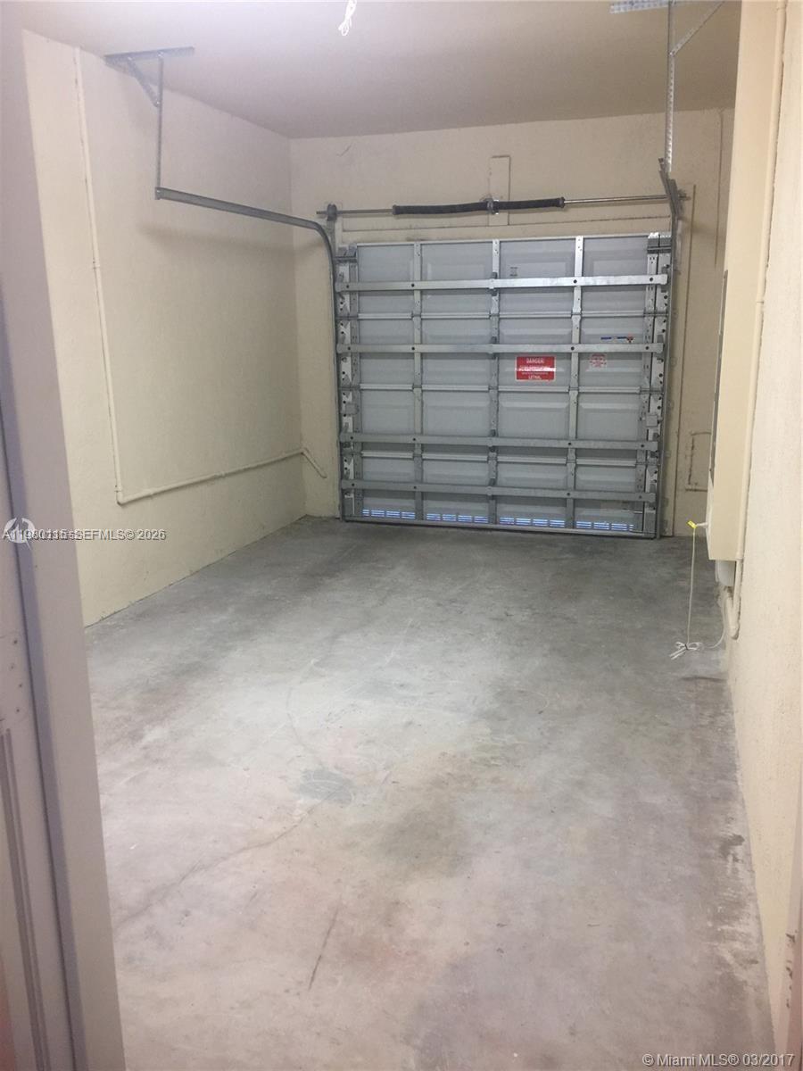 17059 Southwest 96th Street Miami, FL 33196 - Photo 22 of 22 a view of a room with an empty space