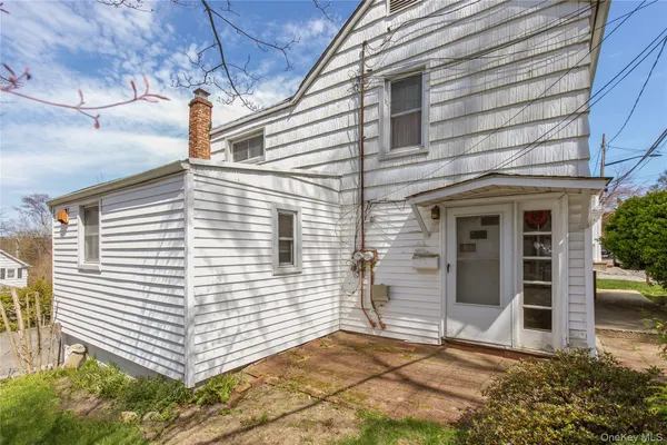 a view of house with outdoor space