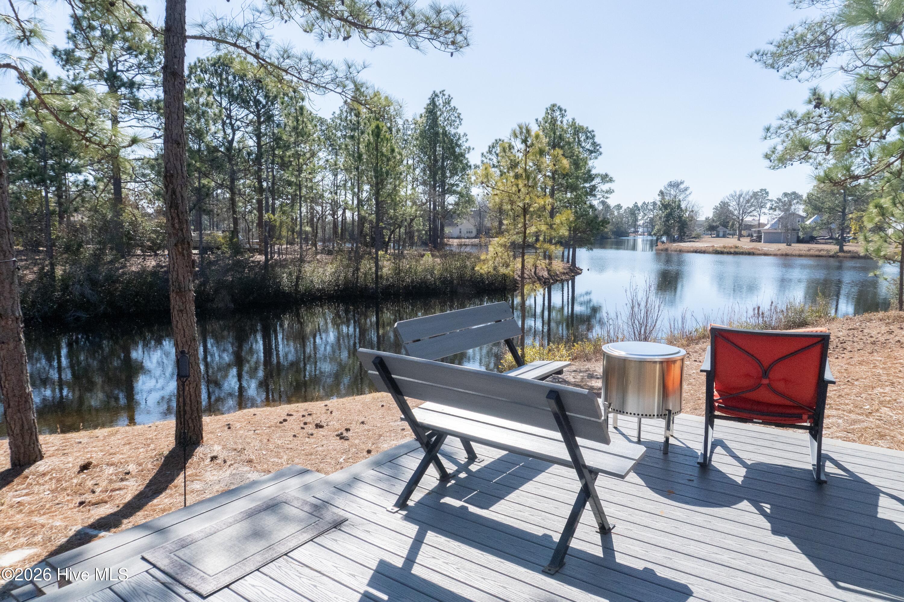 275 Spring Branch Drive Harrells, NC 28444 - Photo 8 of 32 Back Porch Canal View